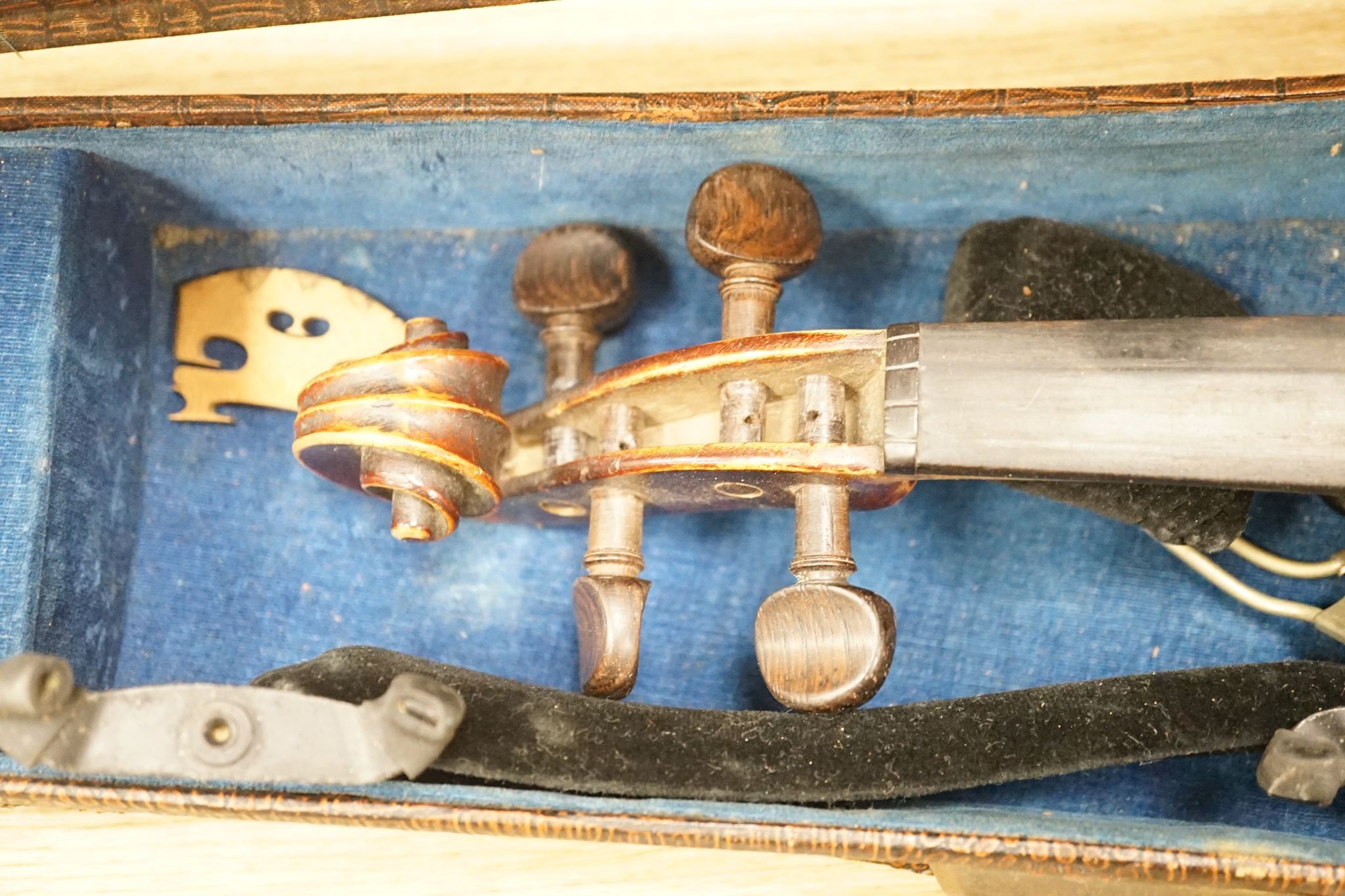 A late 19th century German violin and two bows, cased